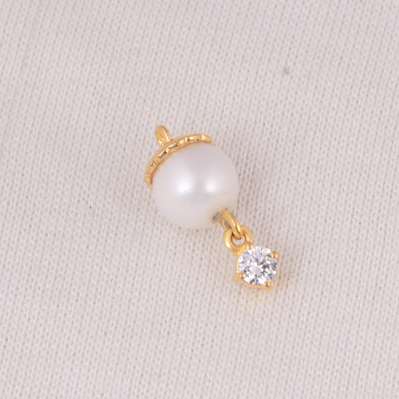 Handmade pearl and zirconia charm from Zaira Jewels